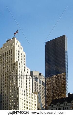 Low angle view of skyscrapers in a city, New York City, New York State, USA View Large Photo Image Stock Photograph - Low angle view of skyscrapers in a city, New York City, New York State, USA. Fotosearch