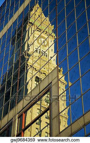 Low angle view of the reflection of a tower on the glass front of a building, Custom House, Boston, Massachusetts, USA View Large Photo Image Stock Photo - Low angle view of the reflection of a tower on the glass front of a building, Custom House, Boston, Massachusetts, USA. Fotosearch