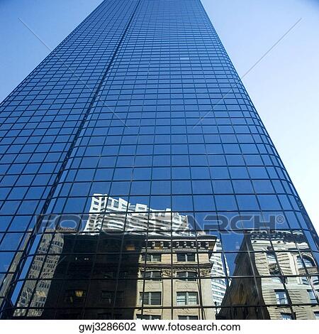 Low angle view of the reflection of buildings on a glass front, John Hancock tower, Boston, Massachusetts, USA View Large Photo Image Stock Image - Low angle view of the reflection of buildings on a glass front, John Hancock tower, Boston, Massachusetts, USA. Fotosearch