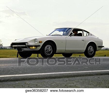 Man driving a car View Large Photo Image Stock Photo - Man driving a car. Fotosearch