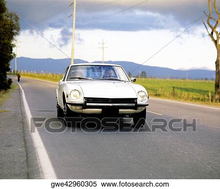 Man driving a car View Large Photo Image Stock Photography - Man driving a car. Fotosearch