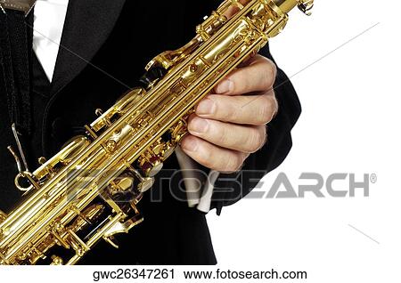 Mid section view of a musician holding a saxophone View Large Photo Image Stock Image - Mid section view of a musician holding a saxophone. Fotosearch