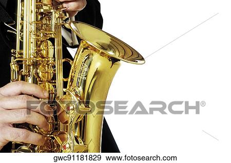 Mid section view of a musician playing the saxophone View Large Photo Image Stock Photo - Mid section view of a musician playing the saxophone. Fotosearch