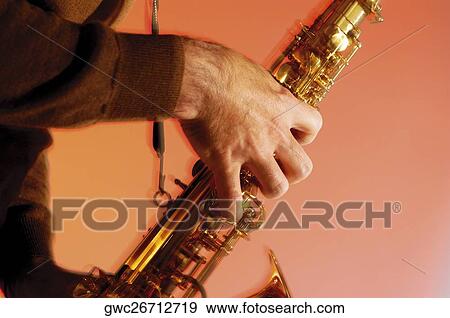 Stock Photo - Musician playing the saxophone. Fotosearch