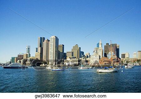 Passenger ship and boats in a river, Boston Harbor View Large Photo Image Stock Photo - Passenger ship and boats in a river, Boston Harbor. Fotosearch