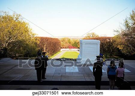 People standing at the Tomb of Unknown Soldier, Arlington National Cemetery, Arlington, Virginia, USA View Large Photo Image Stock Image - People standing at the Tomb of Unknown Soldier, Arlington National Cemetery, Arlington, Virginia, USA. Fotosearch