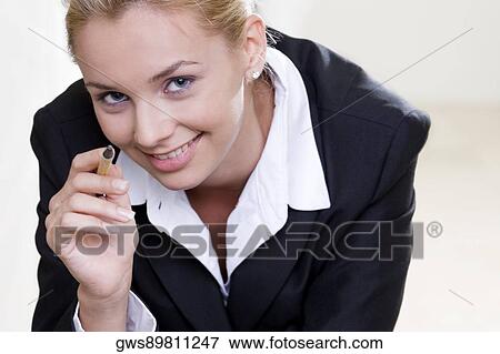 Portrait of a businesswoman smiling View Large Photo Image Stock Photo - Portrait of a businesswoman smiling. Fotosearch