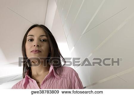 Stock Photo - Portrait of a businesswoman standing. Fotosearch