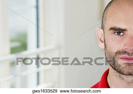 Portrait of a mid adult man looking sad View Large Photo Image Stock Photo - Portrait of a mid adult man looking sad. Fotosearch