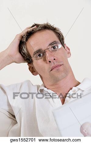 Portrait of a mid adult man looking serious View Large Photo Image Stock Image - Portrait of a mid adult man looking serious. Fotosearch