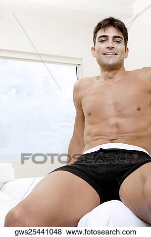 Portrait of a mid adult man smiling View Large Photo Image Stock Photo - Portrait of a mid adult man smiling. Fotosearch