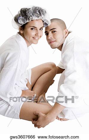 Portrait of a young couple smiling View Large Photo Image Stock Photograph - Portrait of a young couple smiling. Fotosearch