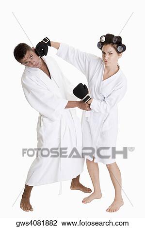 Stock Image - Portrait of a young couple sparring. Fotosearch