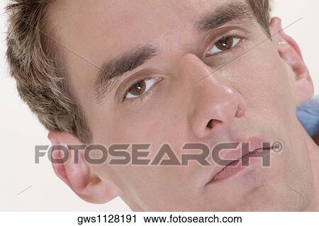 Portrait of a young man View Large Photo Image Stock Image - Portrait of a young man. Fotosearch