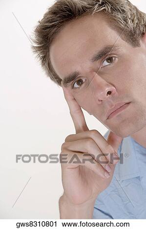 Portrait of a young man View Large Photo Image Stock Image - Portrait of a young man. Fotosearch
