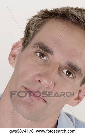 Portrait of a young man View Large Photo Image Stock Photo - Portrait of a young man. Fotosearch