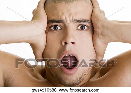 Portrait of a young man with his mouth open View Large Photo Image Stock Photo - Portrait of a young man with his mouth open. Fotosearch