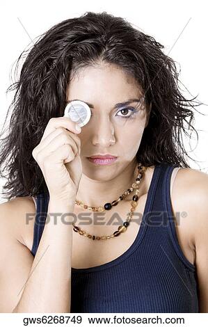 Stock Photo - Portrait of a young woman holding a condom. Fotosearch