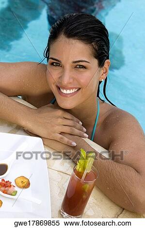 Portrait of a young woman smiling View Large Photo Image Stock Photography - Portrait of a young woman smiling. Fotosearch
