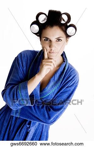 Portrait of a young woman with curlers in her hair View Large Photo Image Stock Image - Portrait of a young woman with curlers in her hair. Fotosearch