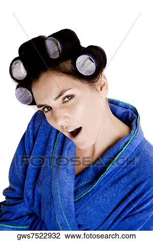 Portrait of a young woman with curlers in her hair and her mouth open View Large Photo Image Stock Image - Portrait of a young woman with curlers in her hair and her mouth open. Fotosearch