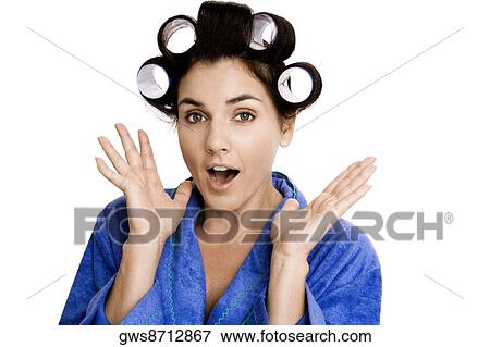 Portrait of a young woman with curlers in her hair View Large Photo Image Stock Photo - Portrait of a young woman with curlers in her hair. Fotosearch