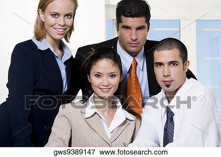 Stock Photo - Portrait of two businessmen and two businesswomen. Fotosearch