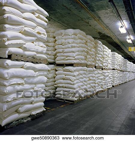 Sacks stacked in a warehouse View Large Photo Image Stock Image - Sacks stacked in a warehouse. Fotosearch
