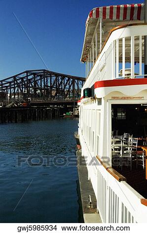 Side profile of a boat at a dock, Boston, Massachusetts, USA View Large Photo Image Picture - Side profile of a boat at a dock, Boston, Massachusetts, USA. Fotosearch