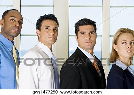 Side profile of three businessmen and a businesswoman standing in a row View Large Photo Image Stock Image - Side profile of three businessmen and a businesswoman standing in a row. Fotosearch