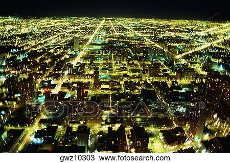 Aerial view of a city lit up at night, Chicago, Illinois, USA View Large Photo Image Stock Image - Aerial view of a city lit up at night, Chicago, Illinois, USA. Fotosearch