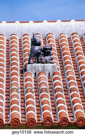 Animal figures on a tiled roof, Taketomi, Ryukyu Islands, Japan View Large Photo Image Stock Photo - Animal figures on a tiled roof, Taketomi, Ryukyu Islands, Japan. Fotosearch