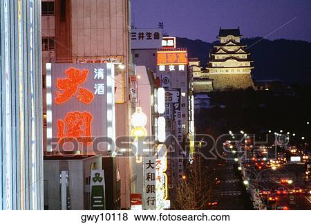 Buildings illuminated at night, Himeji, Japan View Large Photo Image Stock Photo - Buildings illuminated at night, Himeji, Japan. Fotosearch