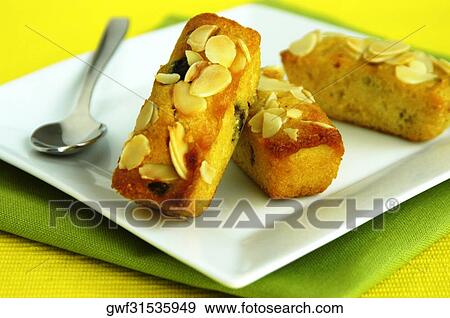 Cake and a spoon in a plate View Large Photo Image Stock Photo - Cake and a spoon in a plate. Fotosearch