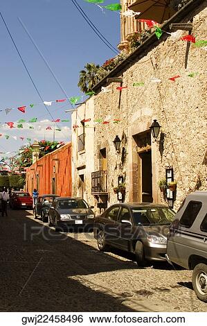 Cars parked on the street, Mexico View Large Photo Image Stock Photograph - Cars parked on the street, Mexico. Fotosearch