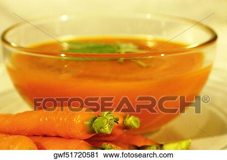 Close-up of a bowl of carrot soup View Large Photo Image Stock Image - Close-up of a bowl of carrot soup. Fotosearch