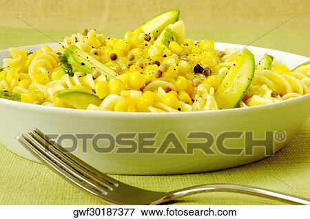Close-up of a bowl of pasta and a fork View Large Photo Image Stock Photo - Close-up of a bowl of pasta and a fork. Fotosearch