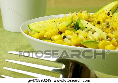 Close-up of a bowl of pasta and a fork View Large Photo Image Stock Photo - Close-up of a bowl of pasta and a fork. Fotosearch