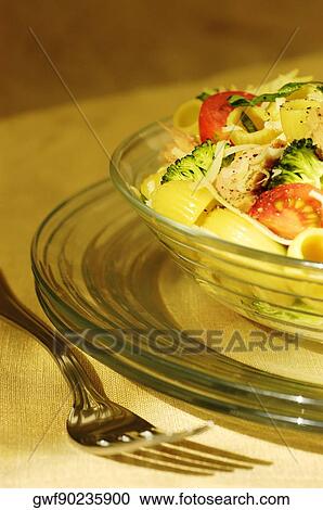 Stock Image - Close-up of a bowl of pasta. Fotosearch