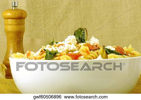 Close-up of a bowl of pasta View Large Photo Image Stock Photograph - Close-up of a bowl of pasta. Fotosearch