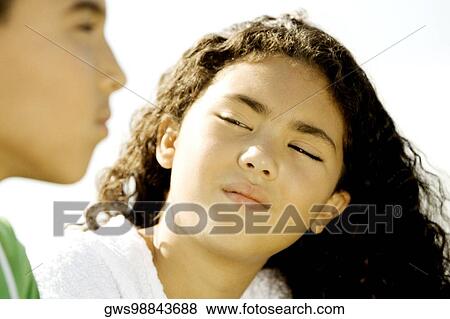 Stock Photo - Close-up of a brother and his sister. Fotosearch