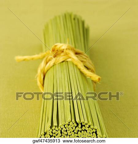 Close-up of a bundle of raw spaghetti View Large Photo Image Stock Image - Close-up of a bundle of raw spaghetti. Fotosearch