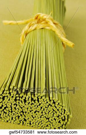 Close-up of a bundle of raw spaghetti View Large Photo Image Stock Image - Close-up of a bundle of raw spaghetti. Fotosearch