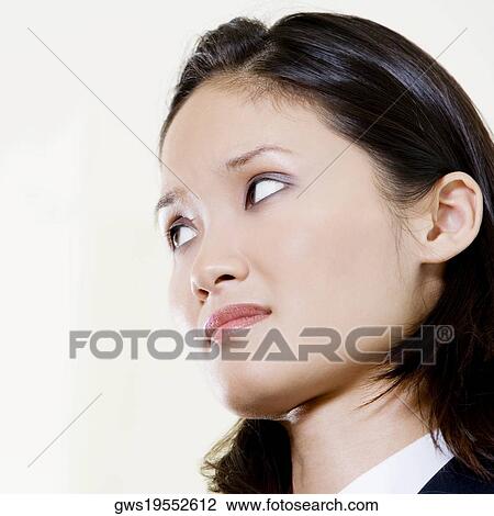 Close-up of a businesswoman looking worried View Large Photo Image Stock Image - Close-up of a businesswoman looking worried. Fotosearch