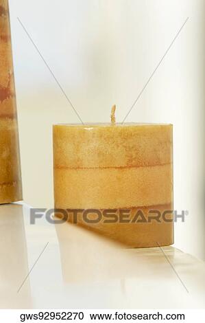 Stock Image - Close-up of a candle. Fotosearch