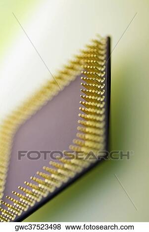 Close-up of a computer chip View Large Photo Image Stock Photo - Close-up of a computer chip. Fotosearch
