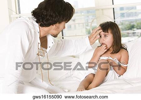 Close-up of a father with his daughter View Large Photo Image Stock Image - Close-up of a father with his daughter. Fotosearch