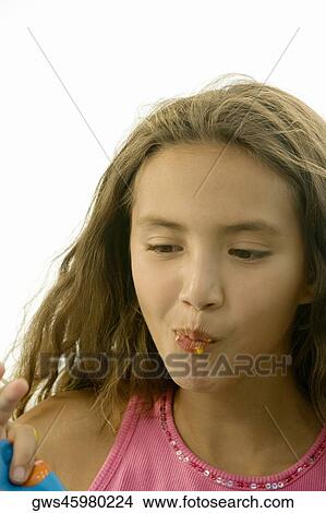 Close-up of a girl puckering her lips View Large Photo Image Picture - Close-up of a girl puckering her lips. Fotosearch