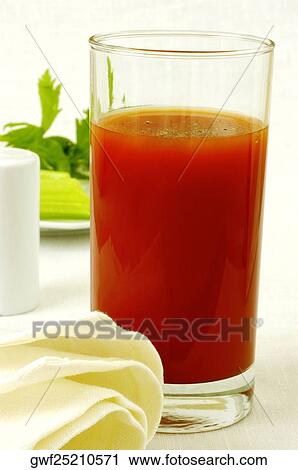 Stock Image - Close-up of a glass of juice. Fotosearch