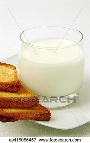 Close-up of a glass of milk and toast View Large Photo Image Stock Photo - Close-up of a glass of milk and toast. Fotosearch